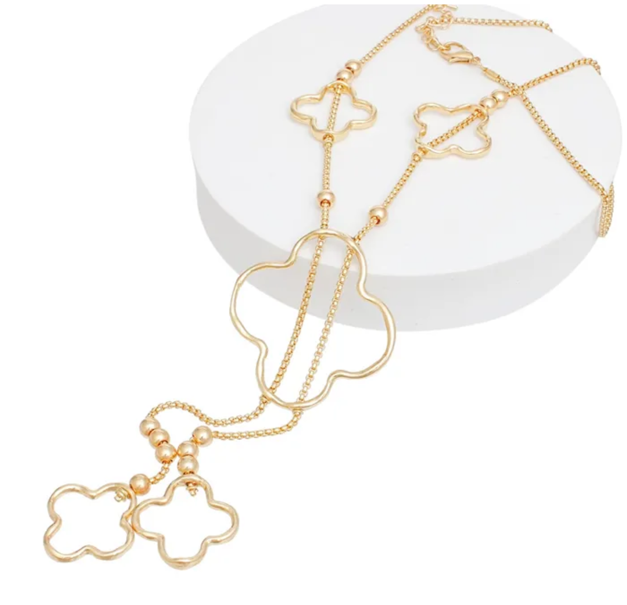Long Gold Quatrefoil Negligee Necklace
Dripping in Elegance