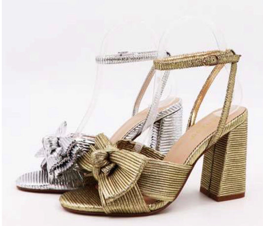 Randall Gold Bow Heel